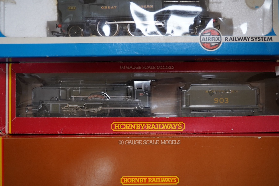 Seven boxed 00 gauge locomotives by Hornby Railways, GMR, Lima, etc. including; an LMS Coronation Class (R.066), two SR Schools Class (R.57 and R.817), a GWR Prairie Tank (54150-1), an LMS Royal Scot Class (54120-0), an